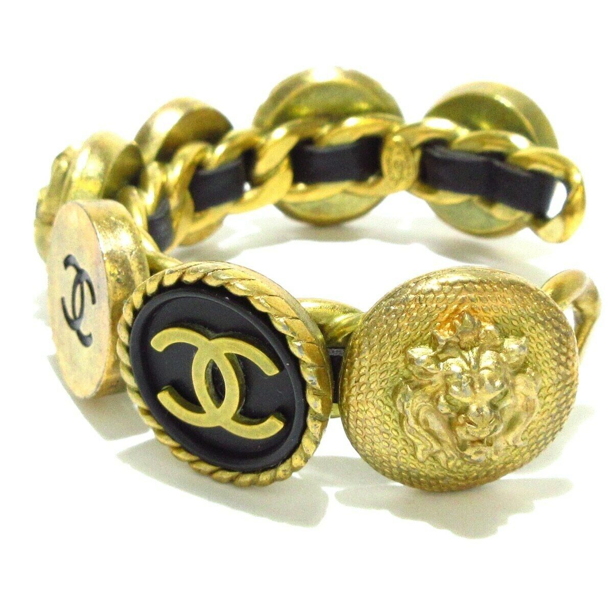 Vintage Chanel cuff bracelet bangle 7 icon charm black round - aptiques by Authentic PreOwned