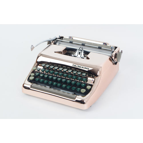 Smith Corona 1955 Rose Gold Plated Typewriter - aptiques by Authentic PreOwned